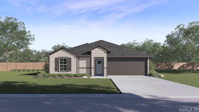 view of front facade with a garage and a front yard