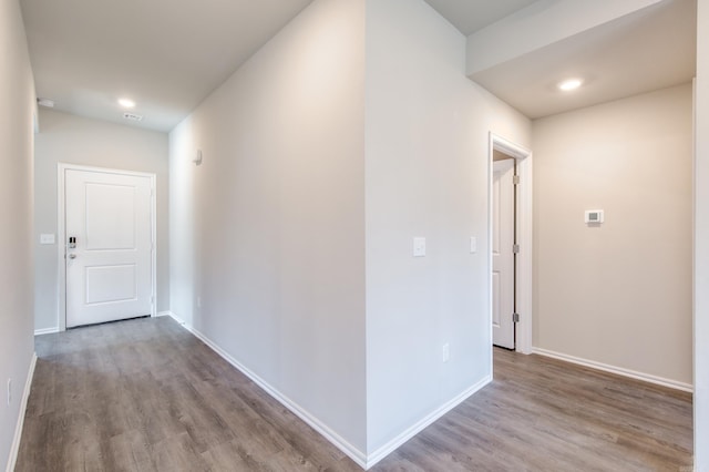 hall with light wood-type flooring