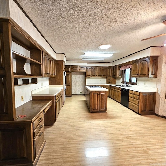 kitchen with dark brown cabinetry, a kitchen island, a textured ceiling, dishwasher, and light hardwood / wood-style floors