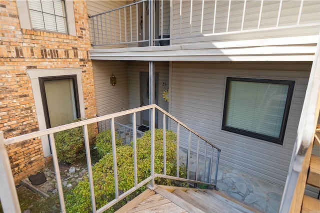 doorway to property with a balcony