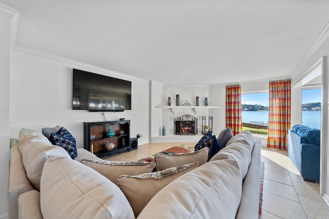 tiled living room featuring a brick fireplace and crown molding