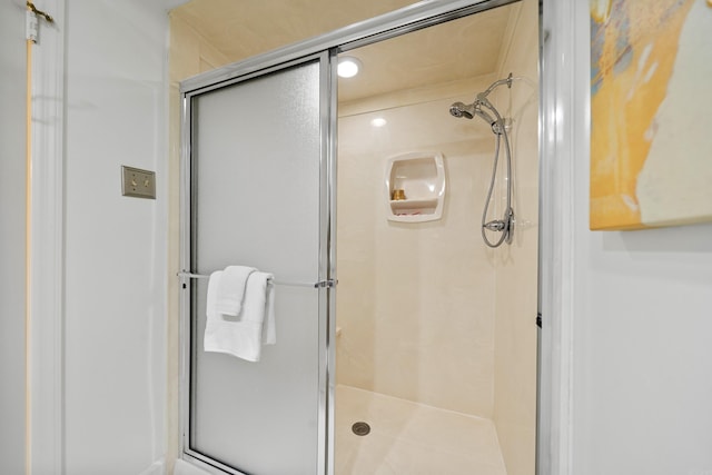 bathroom featuring walk in shower