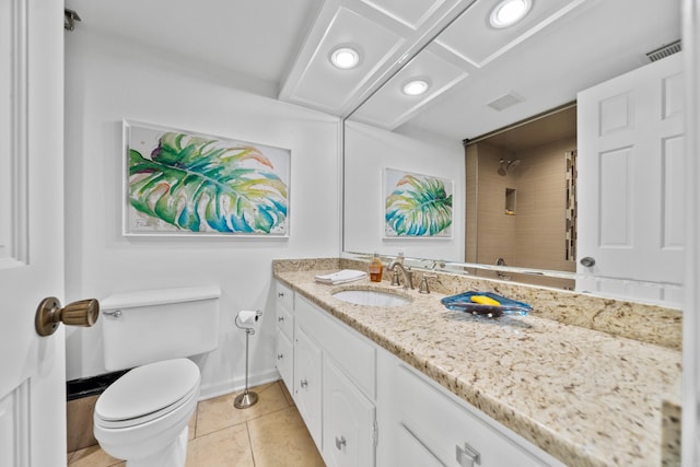 bathroom with walk in shower, vanity, tile patterned flooring, and toilet