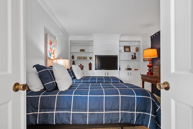 bedroom featuring crown molding