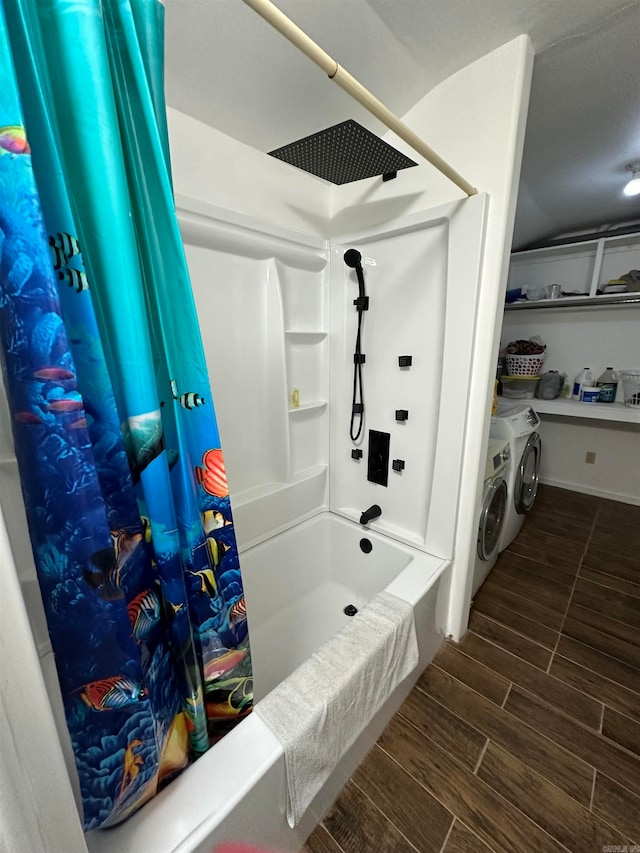 bathroom featuring washing machine and dryer and shower / bath combo