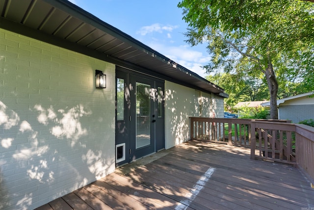 wooden deck with french doors