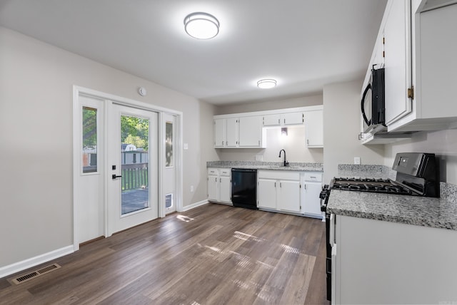 kitchen featuring light stone counters, sink, dark hardwood / wood-style flooring, white cabinetry, and dishwasher