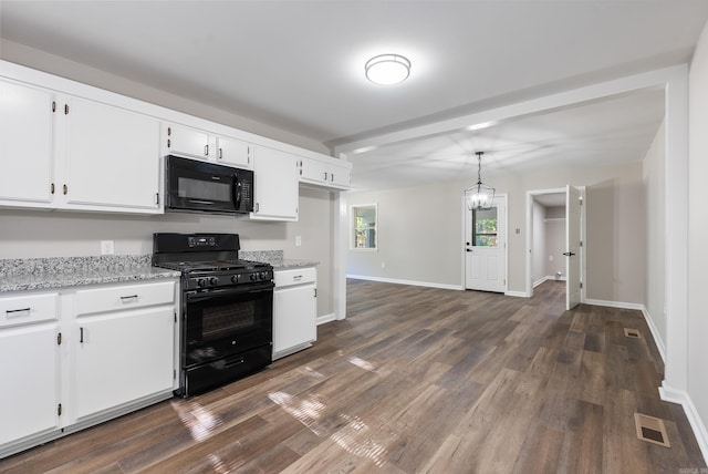 kitchen featuring dark hardwood / wood-style flooring, decorative light fixtures, light stone counters, black appliances, and white cabinetry