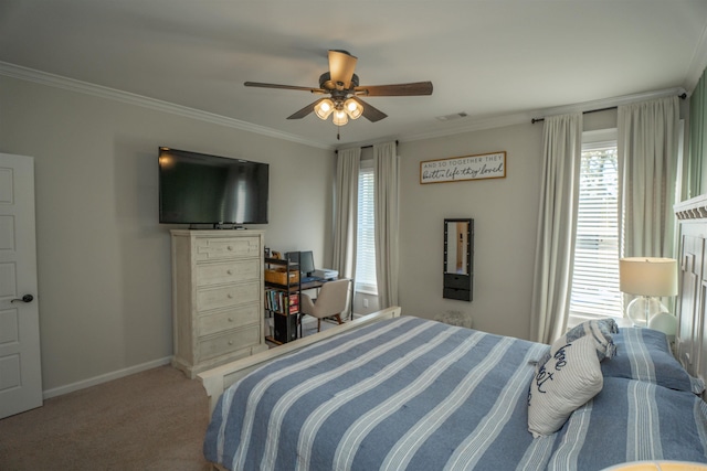 bedroom with ornamental molding, carpet flooring, and ceiling fan