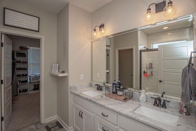 bathroom with vanity and walk in shower