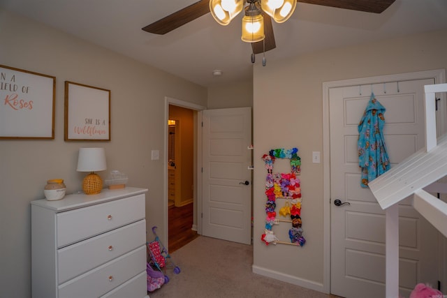 bedroom with light colored carpet and ceiling fan