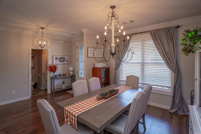 dining space with a notable chandelier, crown molding, and dark hardwood / wood-style flooring