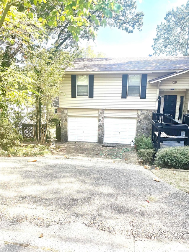 view of side of home featuring a garage