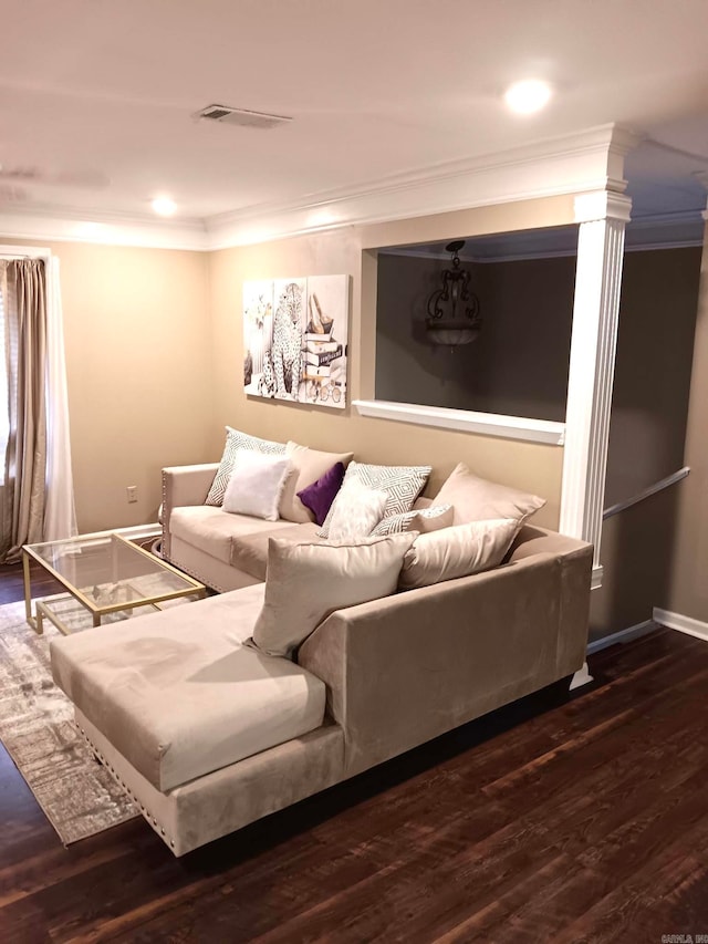 living room with crown molding and dark hardwood / wood-style flooring