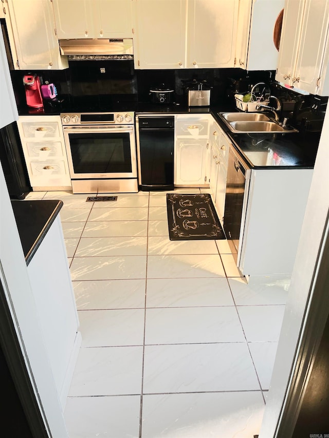 kitchen featuring stainless steel appliances, white cabinets, and sink