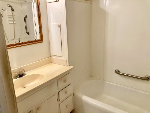 bathroom featuring vanity and shower / bath combination