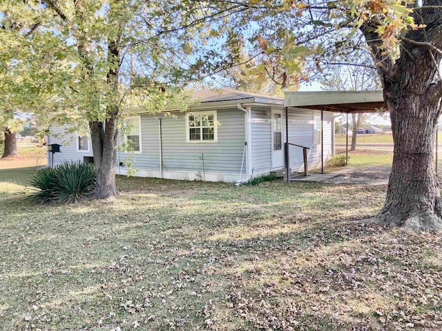 view of property exterior featuring a lawn