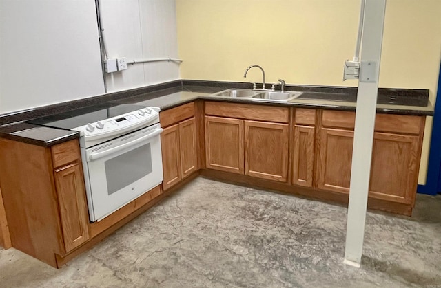 kitchen featuring white range with electric stovetop and sink