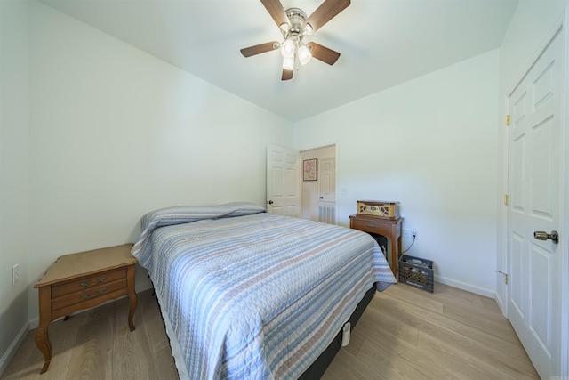 bedroom featuring ceiling fan and light hardwood / wood-style flooring