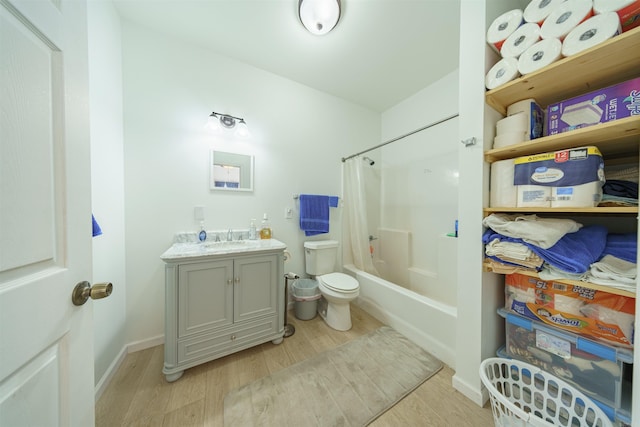 10 Strawberry Valley Rd, Ash Flat, AR 72513 - bathroom with shower / bath combination with curtain, wood finished floors, vanity, and toilet
