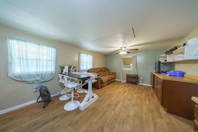 10 Strawberry Valley Rd, Ash Flat, AR 72513 - living room featuring attic access, baseboards, cooling unit, and light wood finished floors