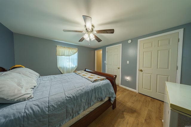 10 Strawberry Valley Rd, Ash Flat, AR 72513 - bedroom featuring baseboards, wood finished floors, and ceiling fan