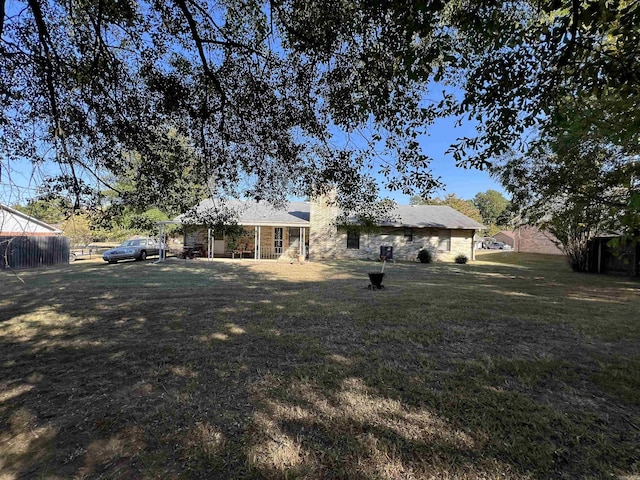 view of front of home with a front yard