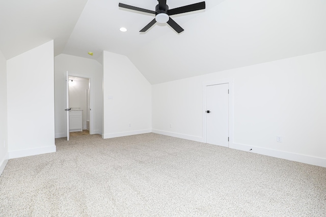 bonus room featuring ceiling fan, carpet floors, and vaulted ceiling