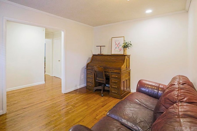 office featuring wood-type flooring and ornamental molding