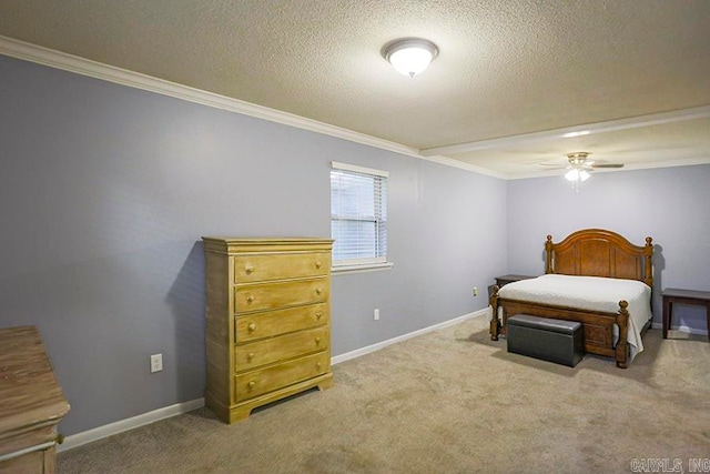 carpeted bedroom with crown molding, ceiling fan, and a textured ceiling