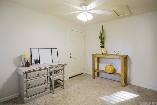 carpeted office featuring ceiling fan