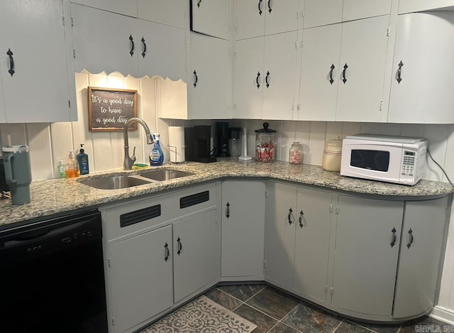 kitchen with white cabinetry, sink, and dishwasher