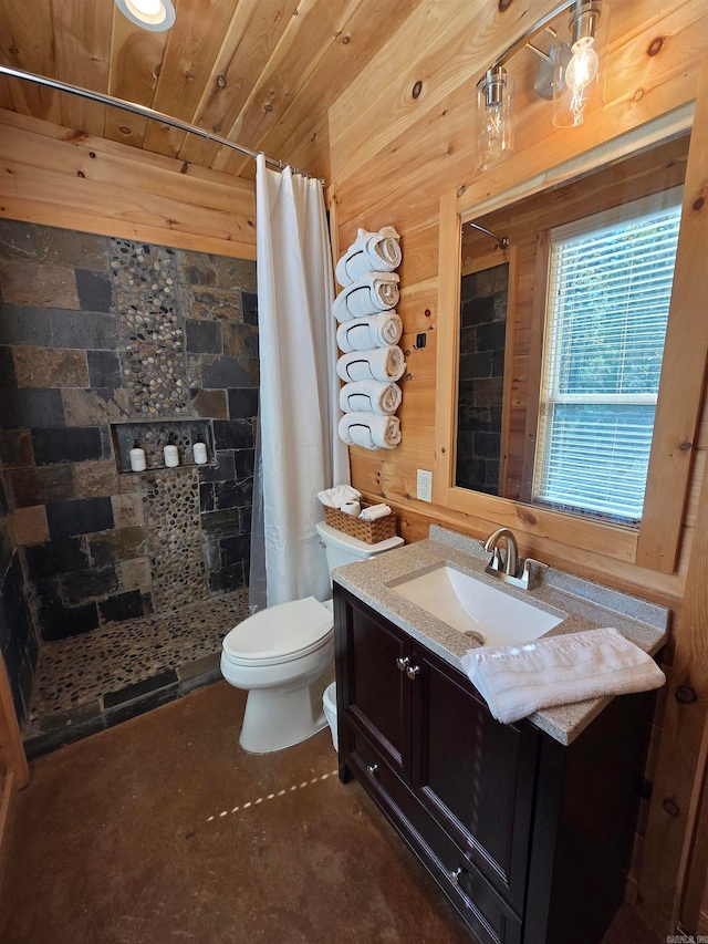 bathroom featuring wooden walls, vanity, wooden ceiling, curtained shower, and toilet