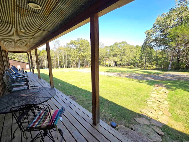 deck featuring a lawn