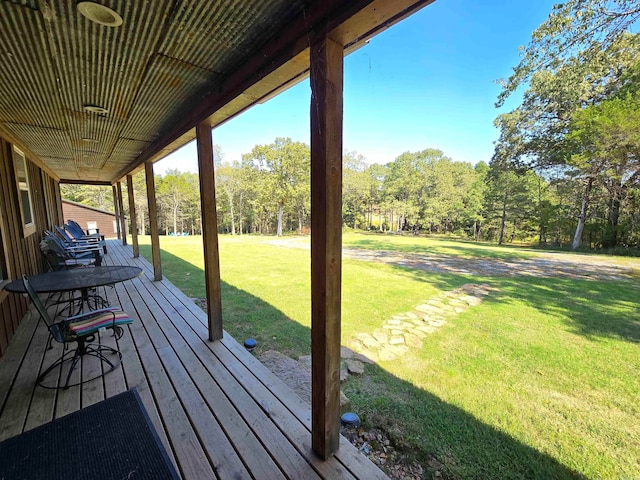 wooden deck with a yard