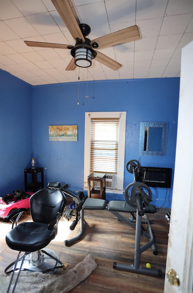 interior space with ceiling fan and hardwood / wood-style flooring