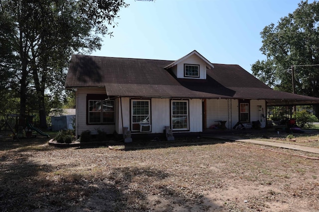 view of front of house with a playground