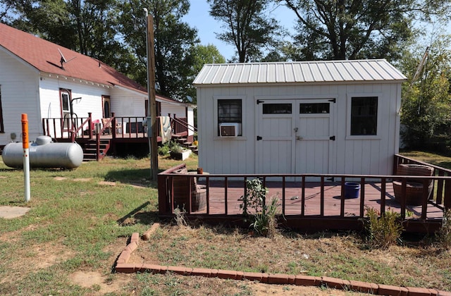 view of outbuilding with a yard