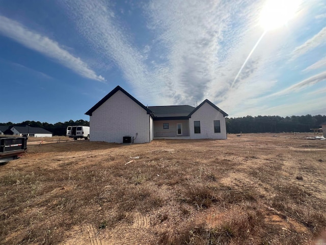 view of property exterior featuring a yard