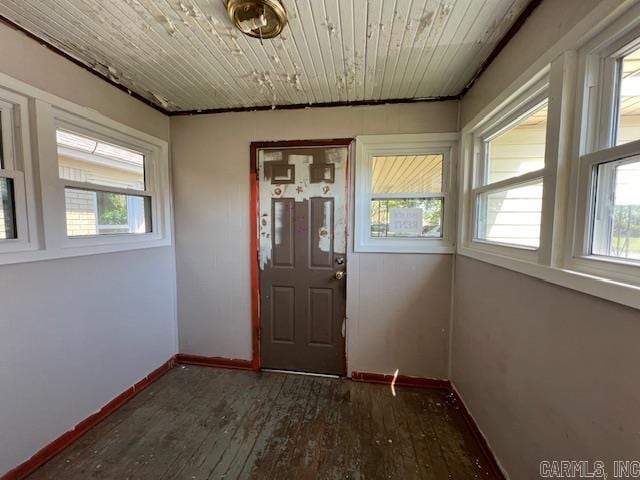 entryway featuring wooden ceiling and dark hardwood / wood-style floors