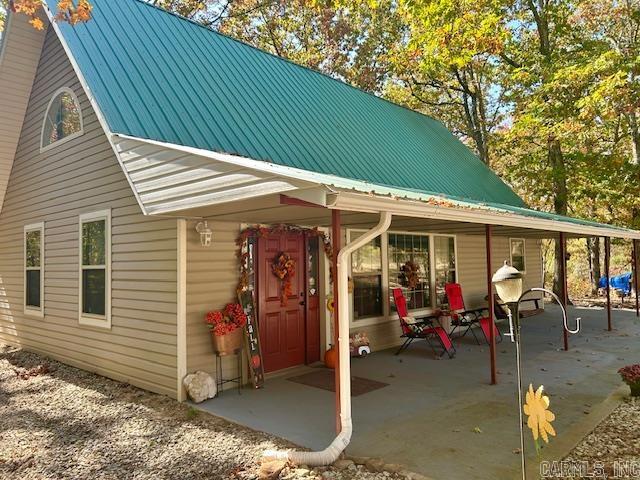 rear view of property with a patio area