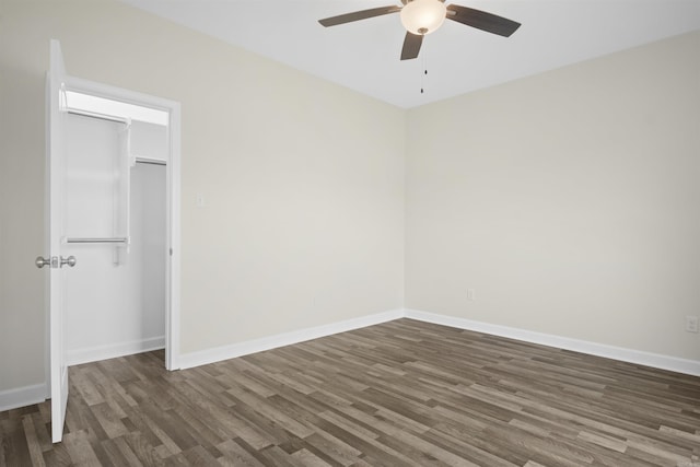 unfurnished bedroom with a closet, ceiling fan, and dark hardwood / wood-style flooring