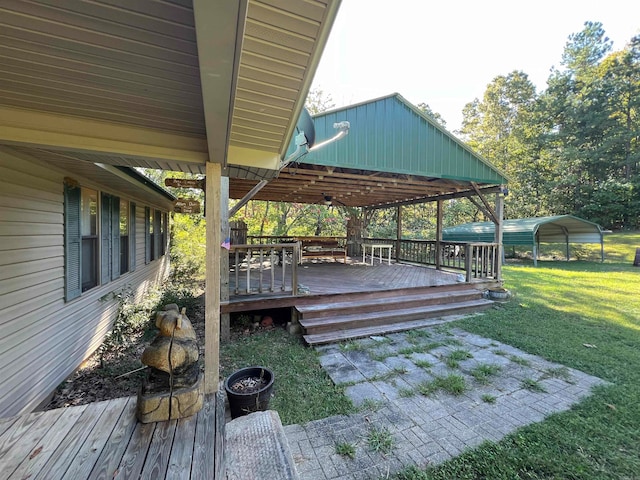 wooden deck with a yard