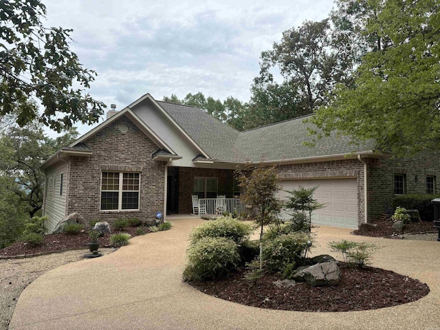 22 Alta Way, Hot Springs Village, AR 71909 - view of front facade featuring brick siding, a chimney, driveway, an attached garage, and roof with shingles