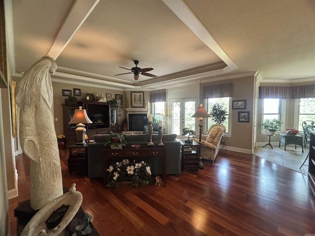 22 Alta Way, Hot Springs Village, AR 71909 - living area featuring a tray ceiling, crown molding, hardwood / wood-style floors, ceiling fan, and baseboards