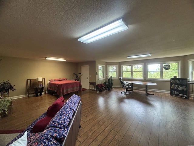22 Alta Way, Hot Springs Village, AR 71909 - rec room with hardwood / wood-style flooring, baseboards, and a textured ceiling
