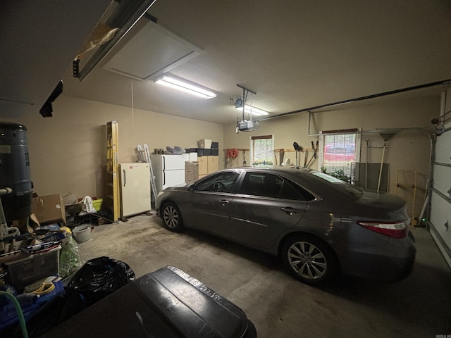 22 Alta Way, Hot Springs Village, AR 71909 - garage with freestanding refrigerator and a garage door opener