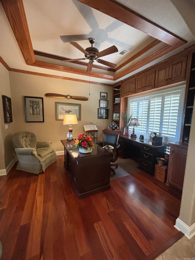 office with ceiling fan, a tray ceiling, beam ceiling, crown molding, and dark hardwood / wood-style floors