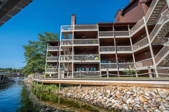 view of property with a water view