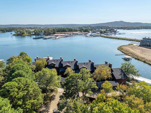 aerial view featuring a water and mountain view